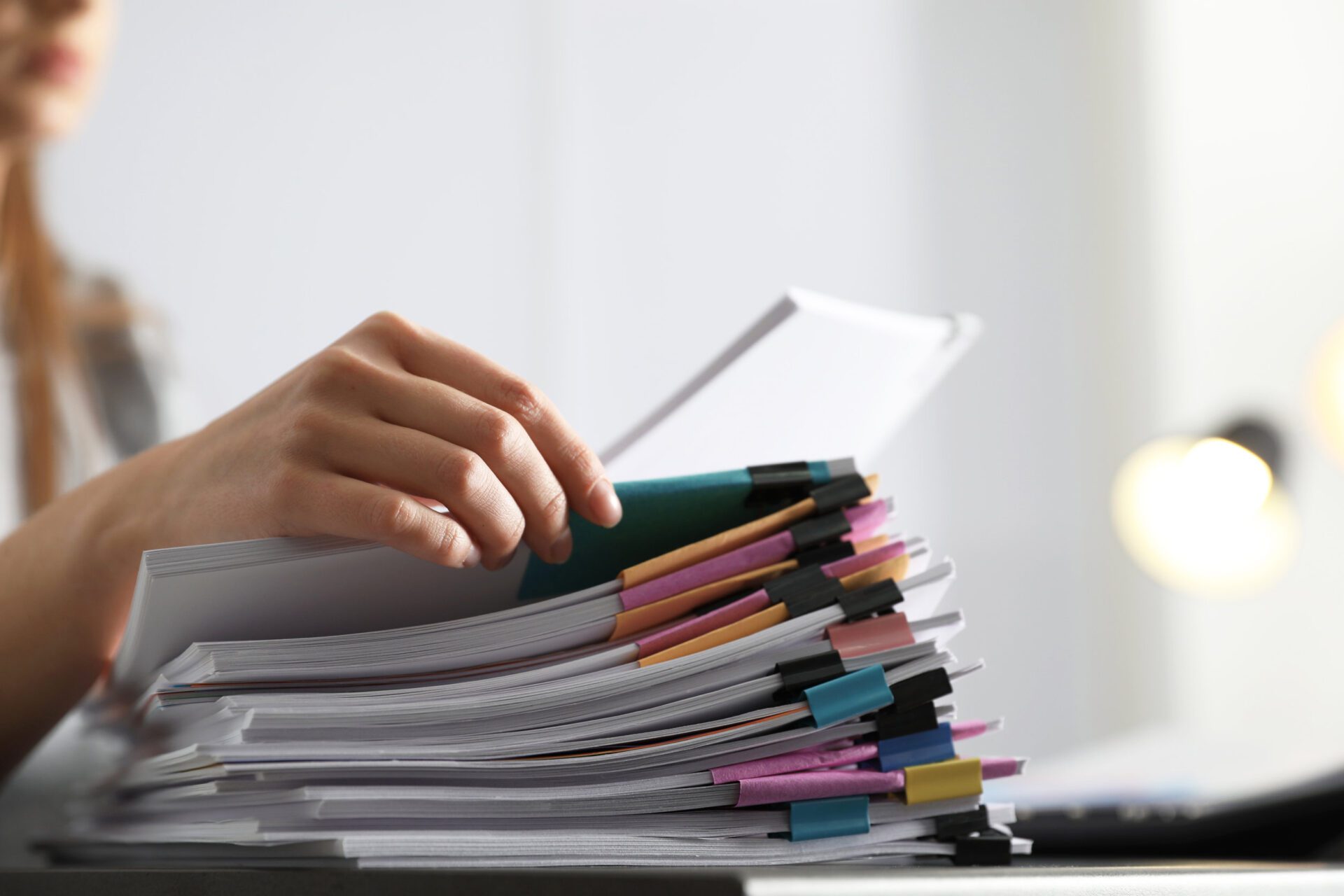 Office employee working with documents at table, closeup Office employee working with documents at table, closeup